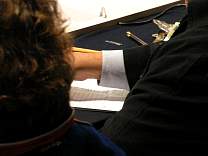 Clamped 1-by-2 holds cable and pencil